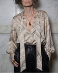 Anjelica Silk Bow Blouse in Pietra Marble Print, styled on model